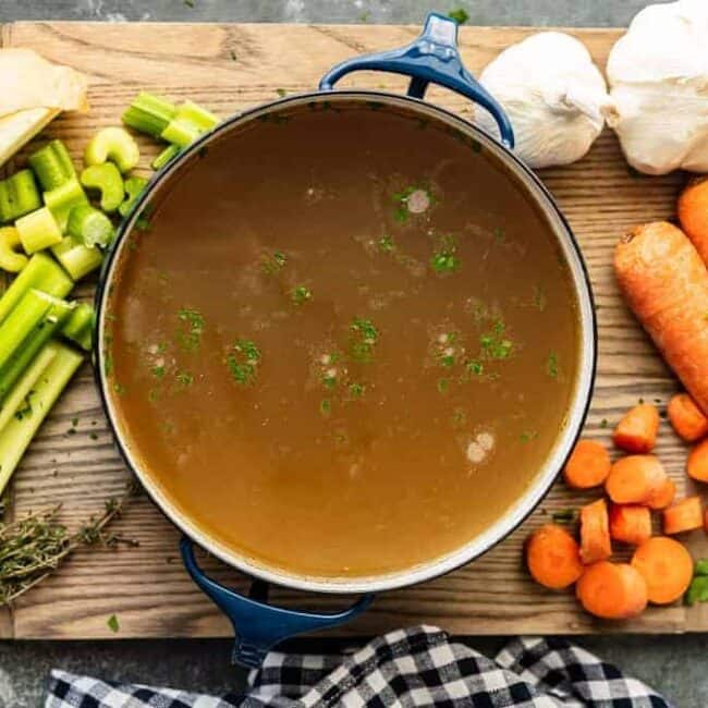 homemade chicken broth in stock pot