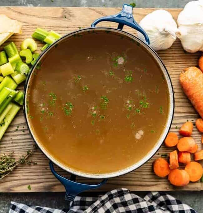 homemade chicken broth in stock pot