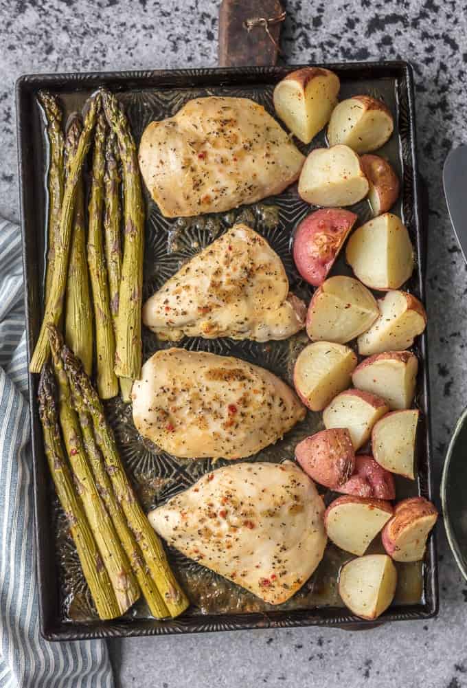 honey garlic chicken and vegetables with asparagus and potatoes in one pan