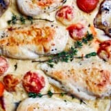 Healthy Chicken in Parmesan Cream Sauce is so delicious and creamy, you'll never believe it doesn't actually include any cream at all! Made with homemade Cashew Cream Sauce, you'll never miss that heavy cream. This Creamy Parmesan Chicken is simply one of our favorite easy chicken recipes!