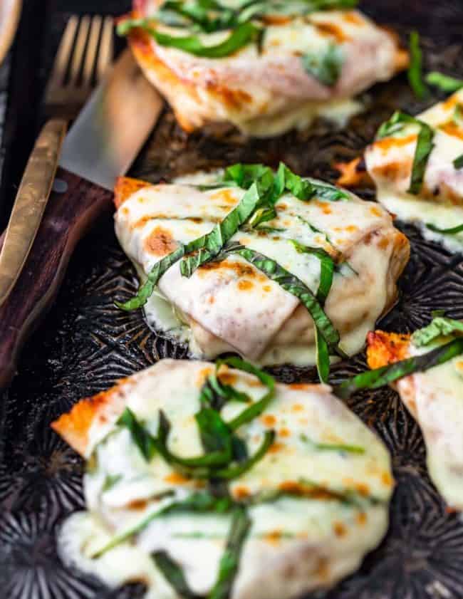 Cheesy Chicken Prosciutto is a delicious and simple recipe perfect for those busy weeknights. This easy chicken recipe consists of pan seared chicken, prosciutto ham, provolone cheese, and fresh basil. From start to finish, this Sheet Pan Prosciutto Chicken is made in under 30 minutes and is sure to please!