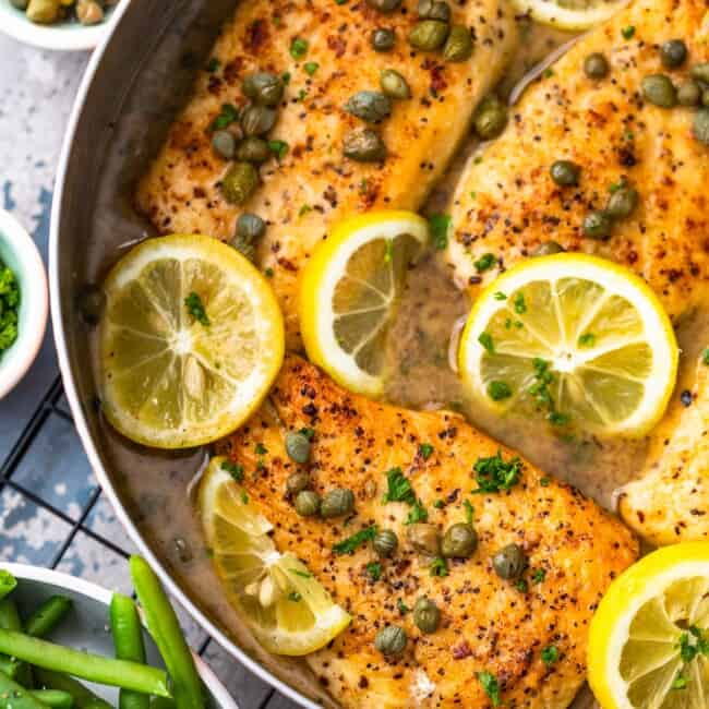 Easy Chicken Piccata is an amazing dinner made in minutes that the entire family will love. This one pan Lemon Chicken Piccata Recipe has only 7 ingredients and is packed with SO much flavor. This easy chicken recipe is one of our all-time favorites!