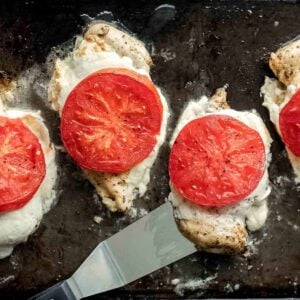 This Sheet Pan Chicken Caprese recipe is quick, easy, and even a little bit fancy. Easy Caprese Chicken is the perfect easy chicken recipe for busy weeknights! Five basic ingredients and one sheet pan are all you need to make this healthy Italian-inspired meal.