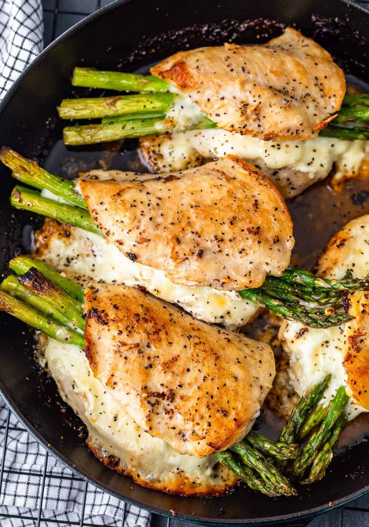 Cheesy Asparagus Stuffed Chicken Breast in skillet