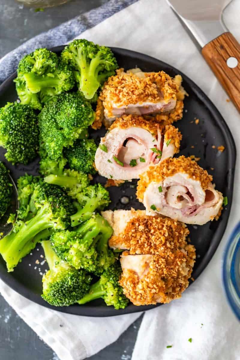 Baked Chicken Cordon Bleu is a delicious and healthy take on a classic chicken recipe. Layers of tender chicken, cheese, ham, and dijon sauce make this easy chicken recipe epic and a total mainstay.