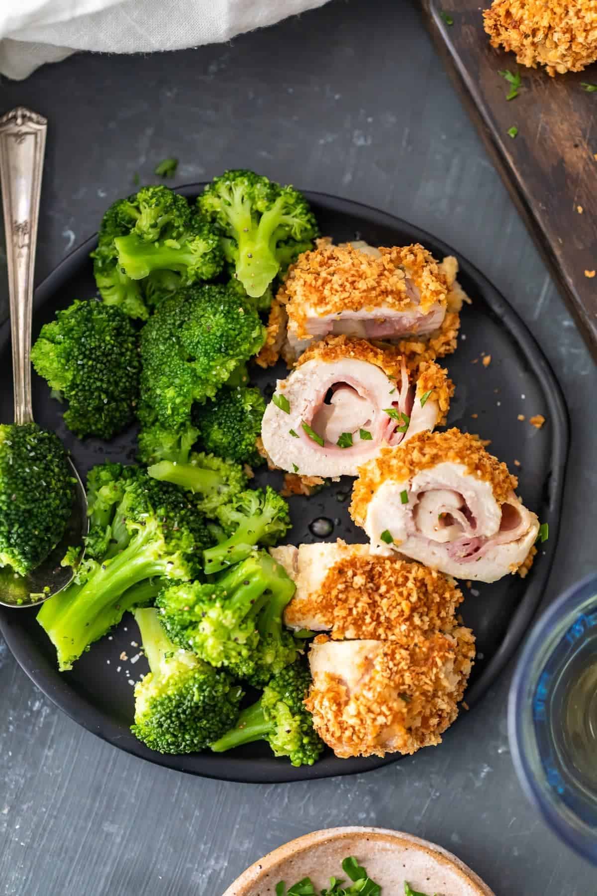 Baked Chicken Cordon Bleu with broccoli and creamy dijon sauce