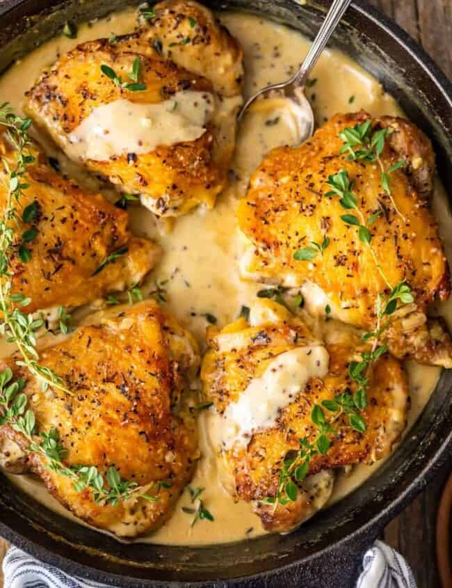 Chicken in White Wine Sauce is our favorite way to make Creamy Chicken Dijon! This amazing White Wine Sauce has 3 types of mustard and is sure to please. This easy chicken recipe can be dressed up for date night, or reheated for lunch on the go. Amazing!