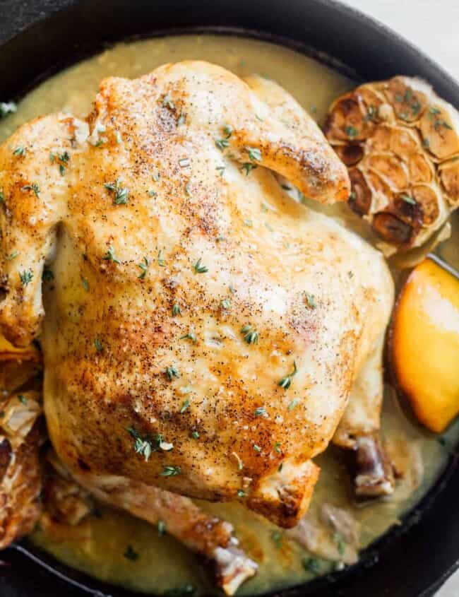 garlic lemon roast chicken in cast iron skillet