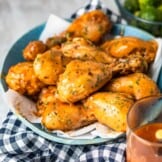 Slow Cooker BBQ Chicken Drumsticks feature an easy Homemade BBQ Sauce that is to die for! Everything cooks together in the crock pot and at the end of the day you're ready to eat! This is our go-to easy family meal when we are craving homemade bbq chicken.