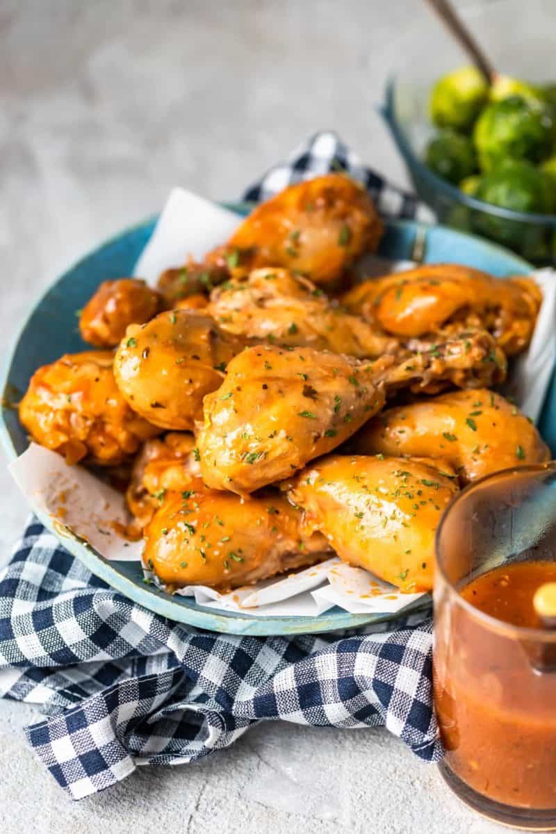 a plate of slow cooker BBQ drumsticks 