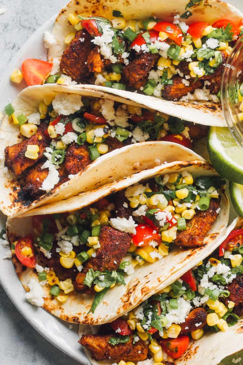 up close cilantro lime chicken tacos on plate