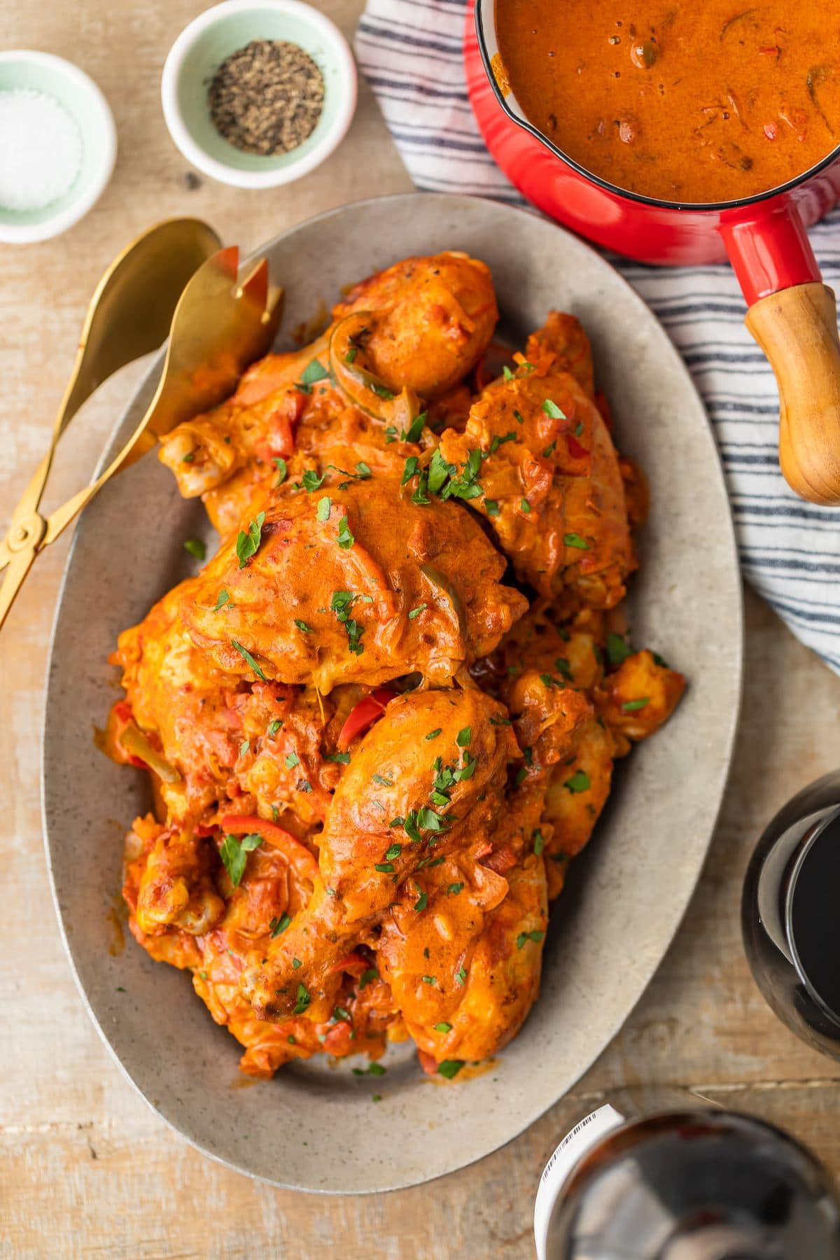 chicken paprikash on a platter with sauce