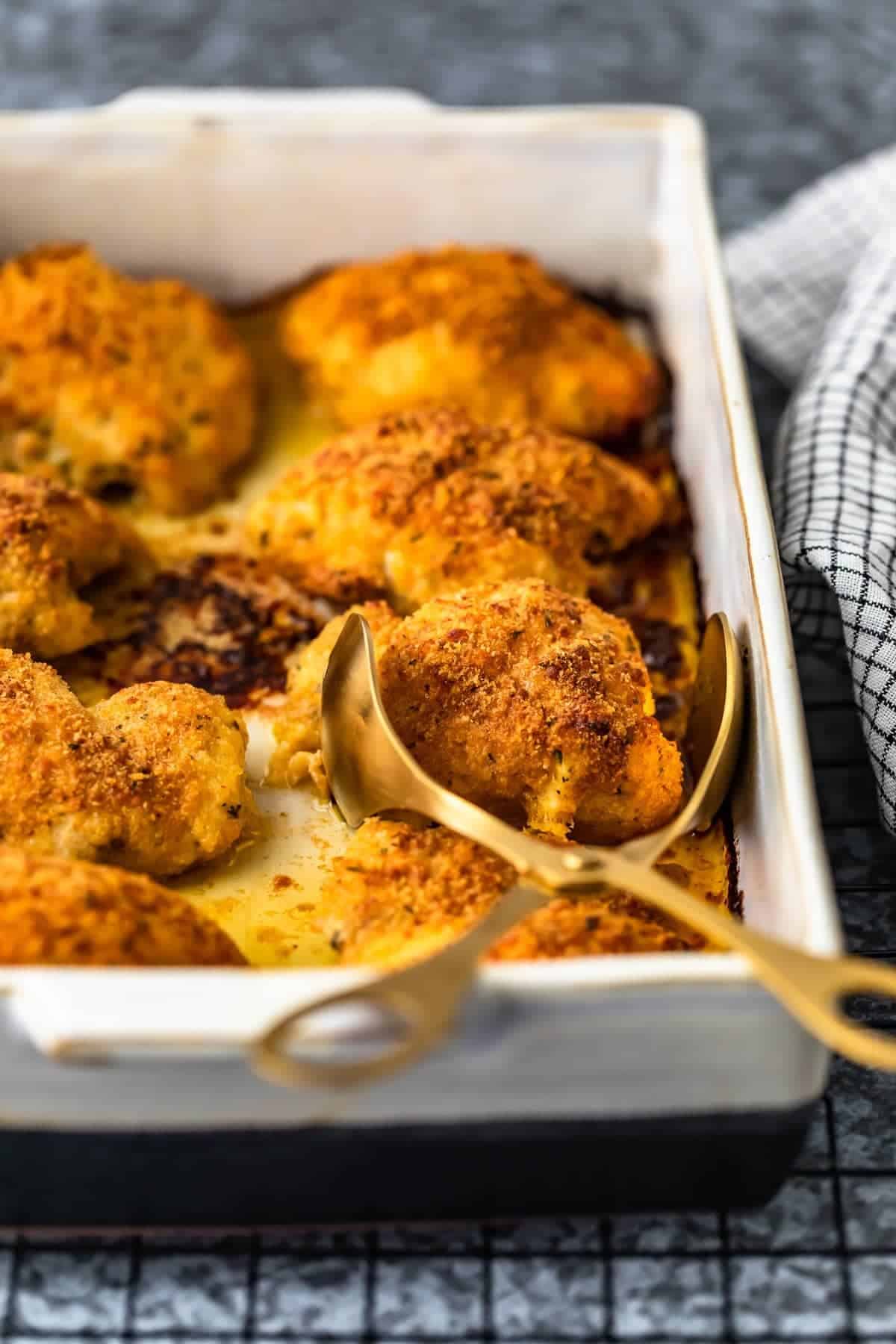 oven fried chicken with parmesan in baking dish