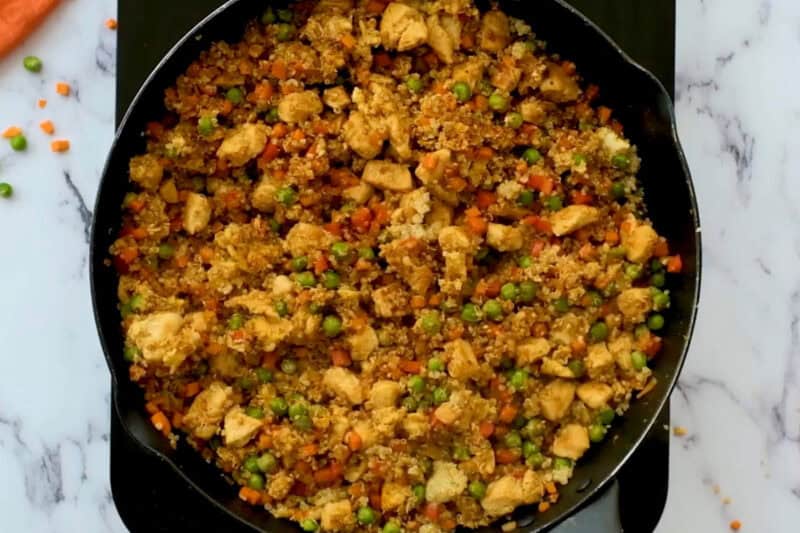 quinoa chicken fried rice in a pan.
