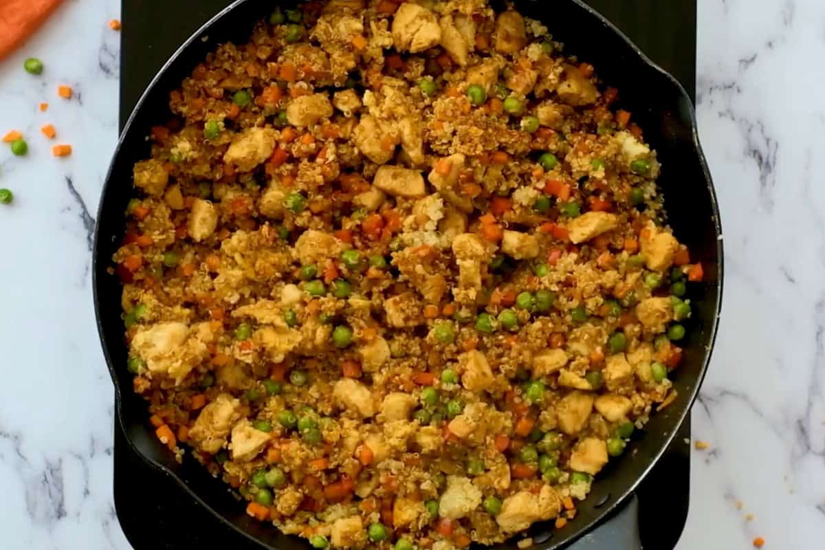 quinoa chicken fried rice in a pan.