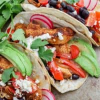 Blackened Chicken Tacos are one of our favorite fun easy chicken recipes for any day of the year! This Spicy Chicken Tacos Recipe is easy to prepare, and sure to please everyone from kids to adults. One of our favorite easy taco recipes!