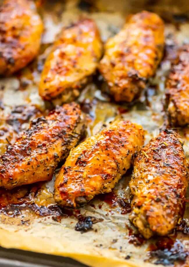 up close picture of baked chicken wings on sheet pan