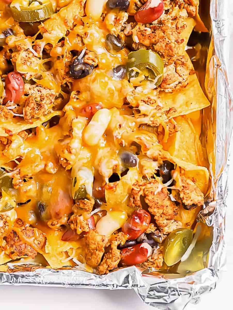 cheesy chicken nachos on sheet pan