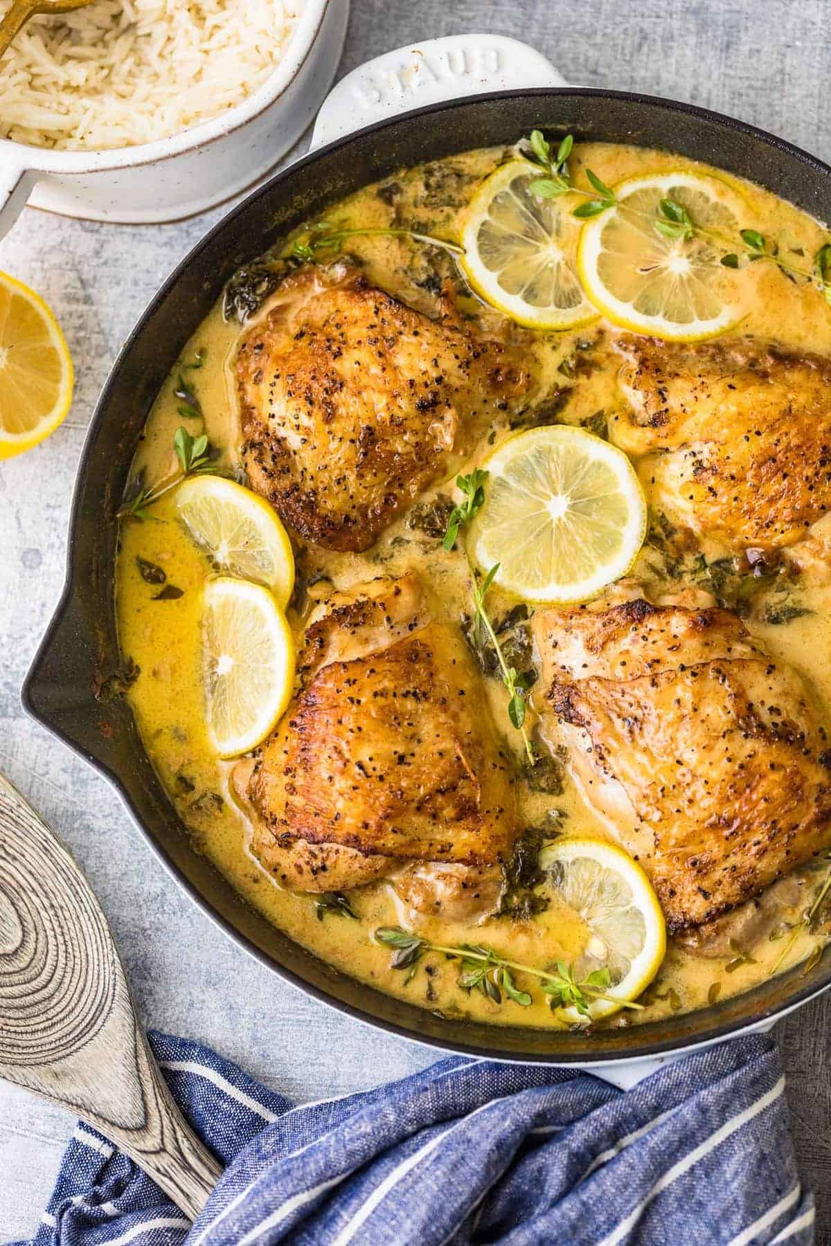 Cooked lemon butter chicken thighs in a skillet