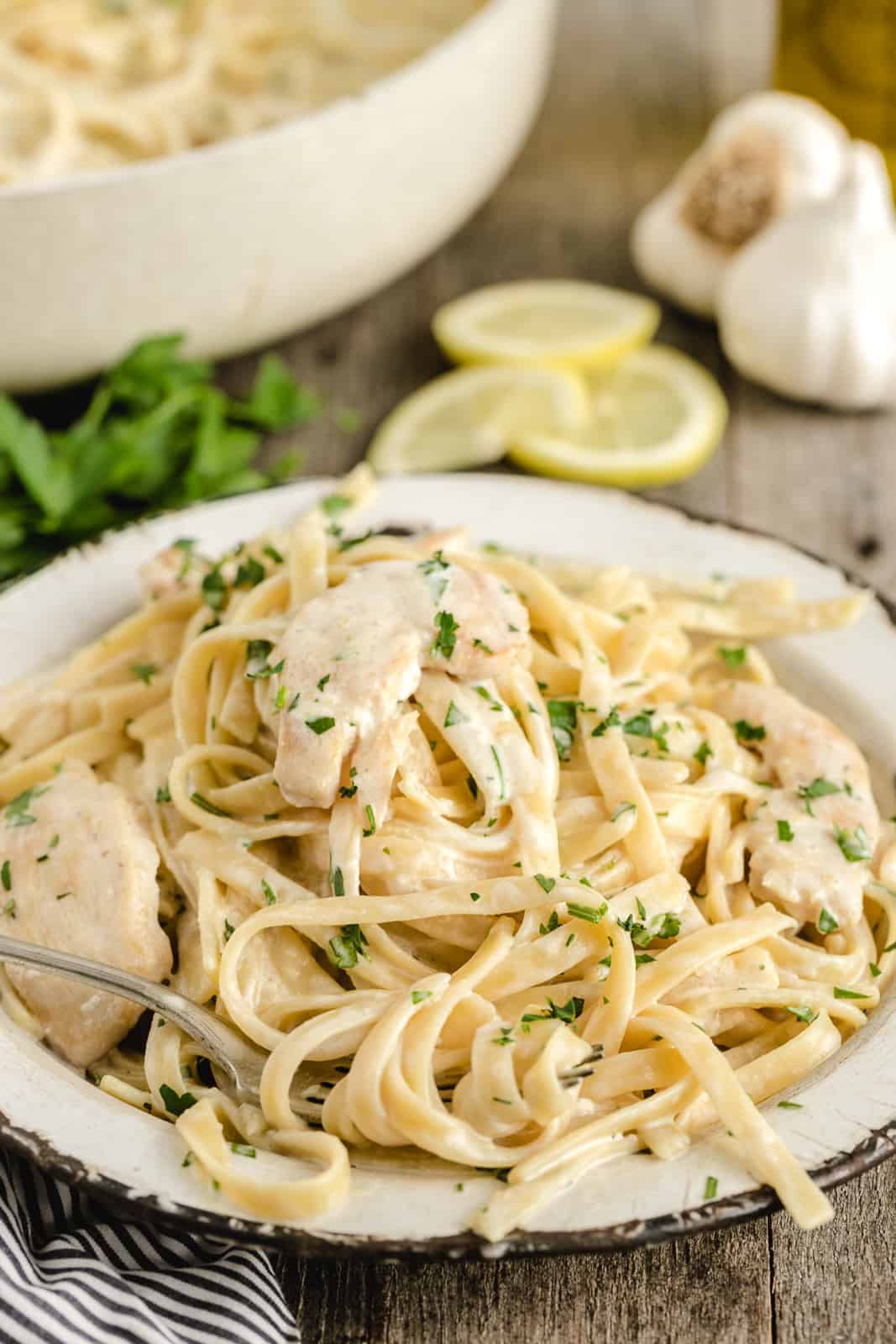 pasta with chicken and alfredo sauce on a plate