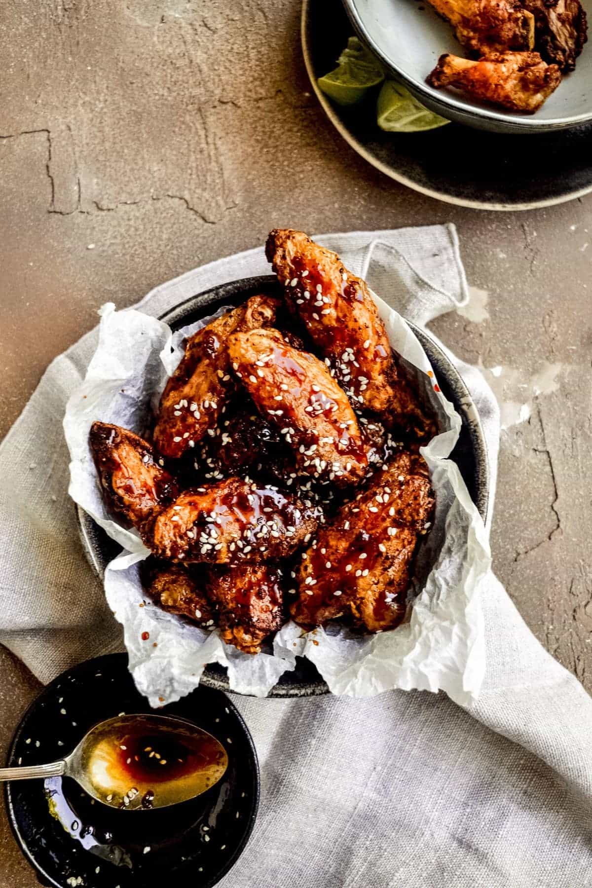 Soy Honey Glazed Chicken Wings topped with sesame seeds