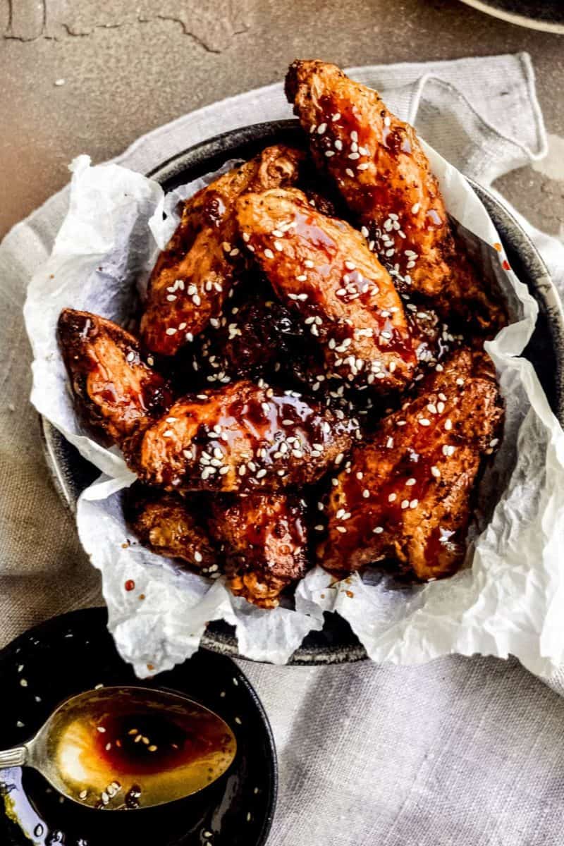 Honey glazed Asian chicken wings with sesame seeds.