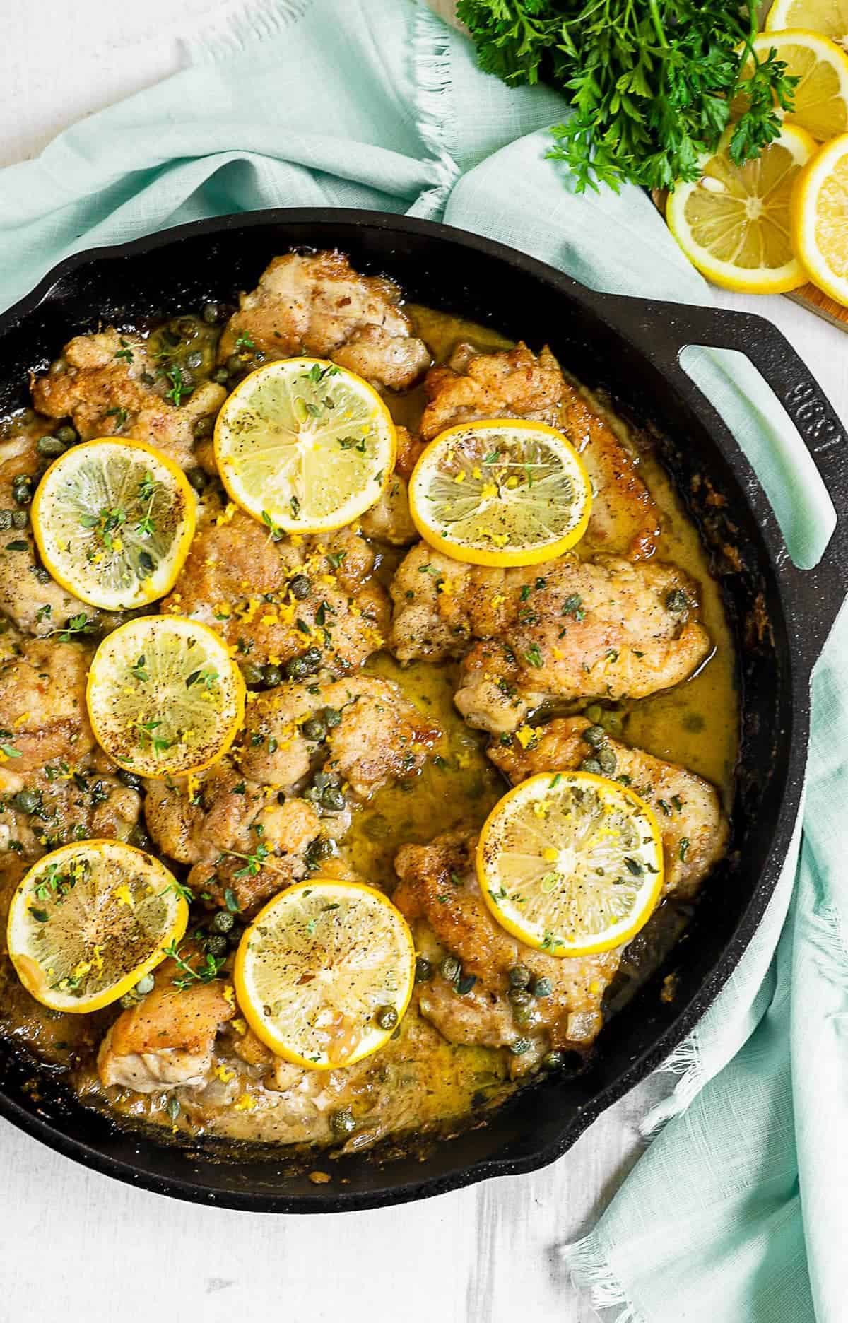 The baked chicken dish in a skillet