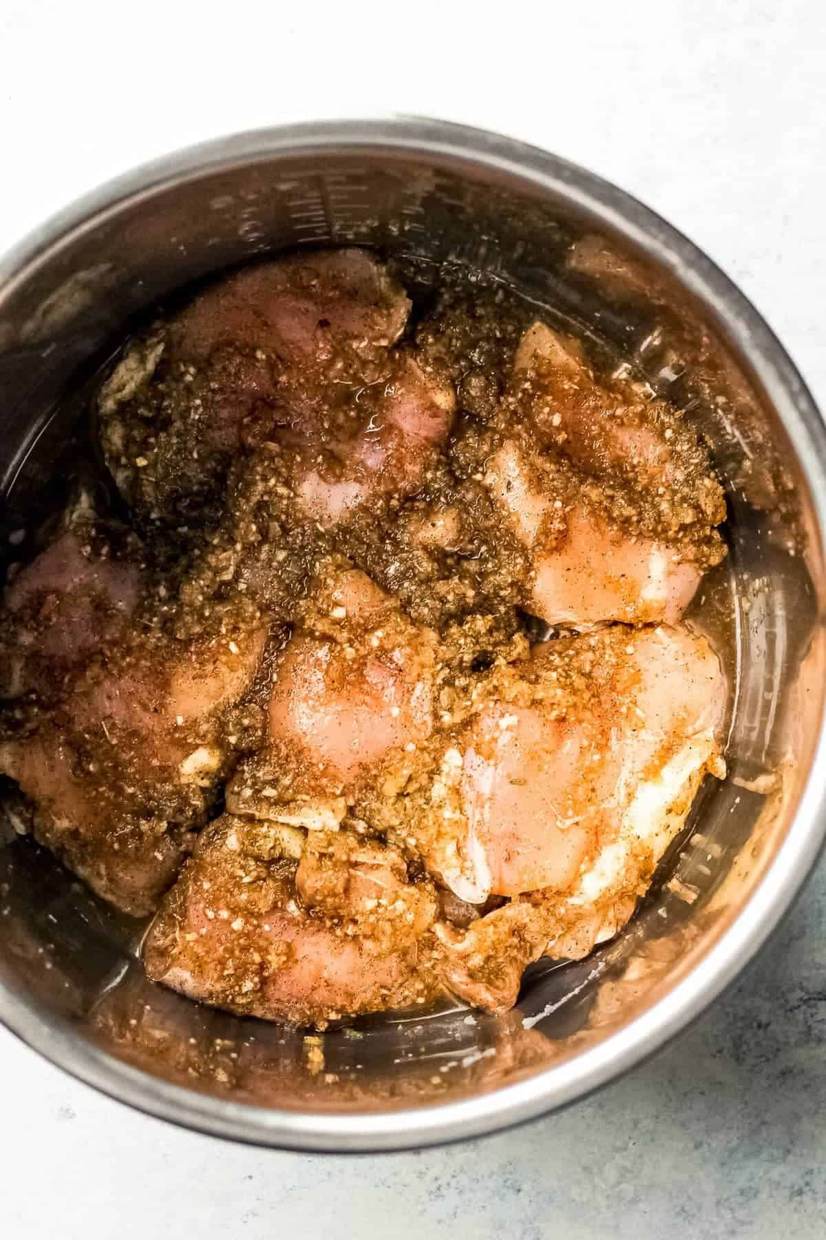 Chicken marinating in the jerk seasoning