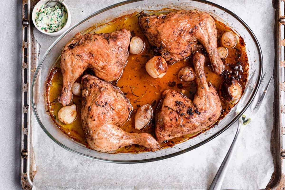 The chicken in a baking dish before cooking