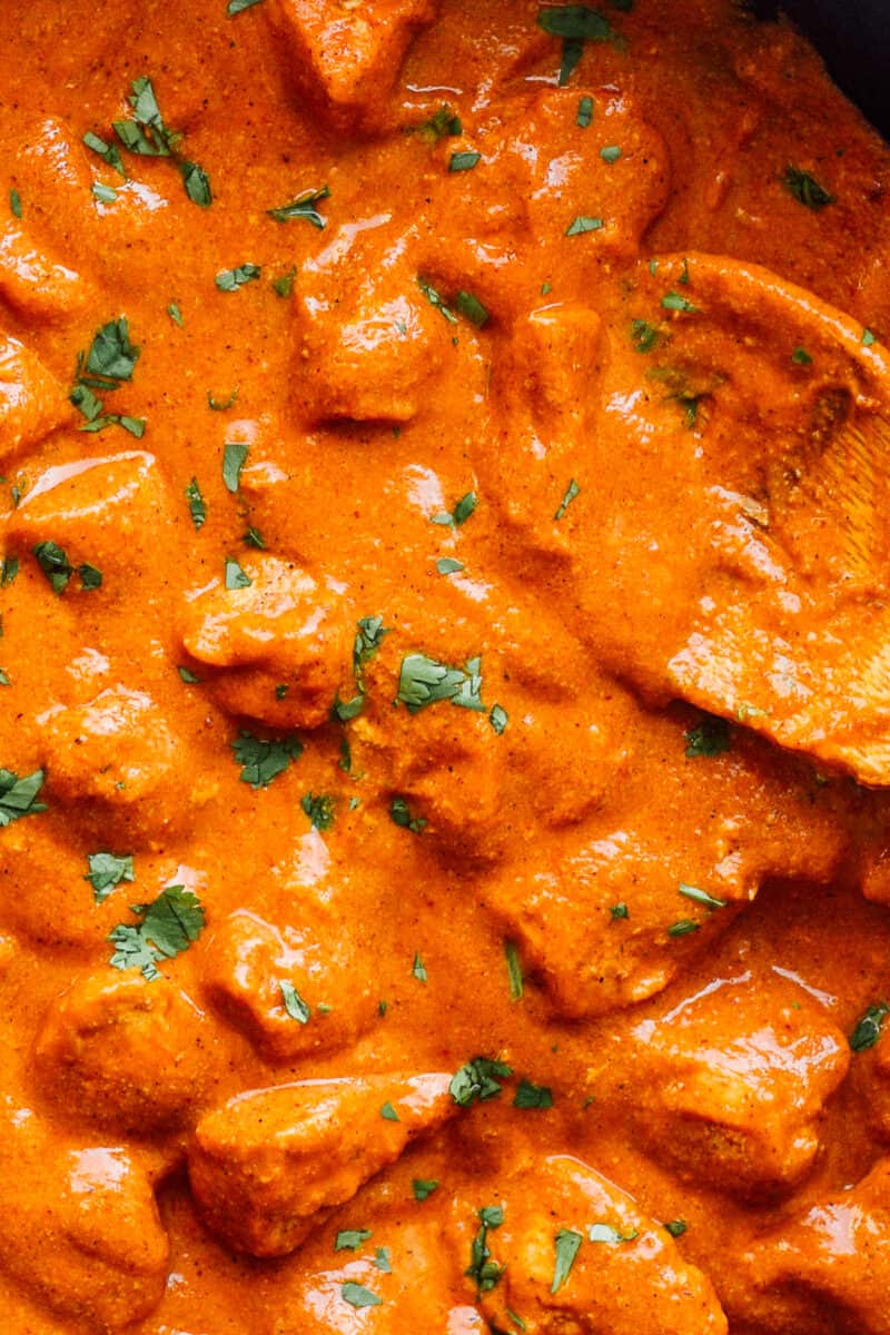up close image of butter chicken in sauce