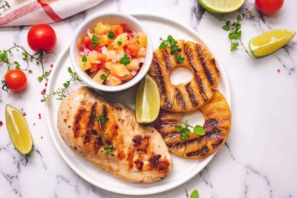 grilled chicken and pineapple on a plate
