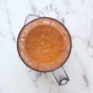 butter chicken sauce in a blender after blending.