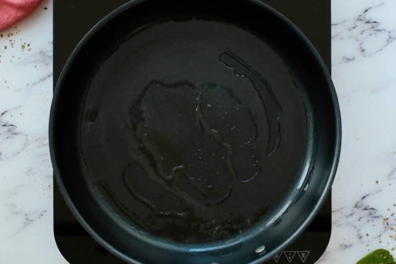 melted coconut oil in a skillet.