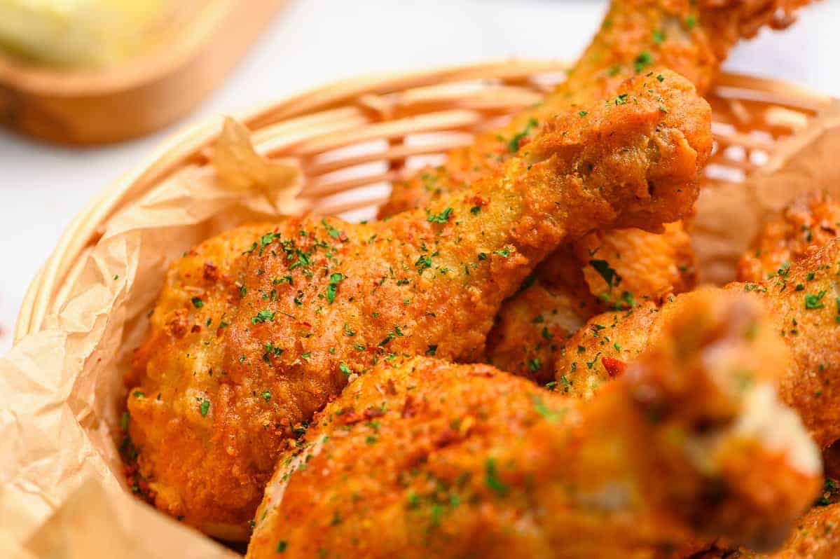 up close picture of baked fried chicken drumsticks
