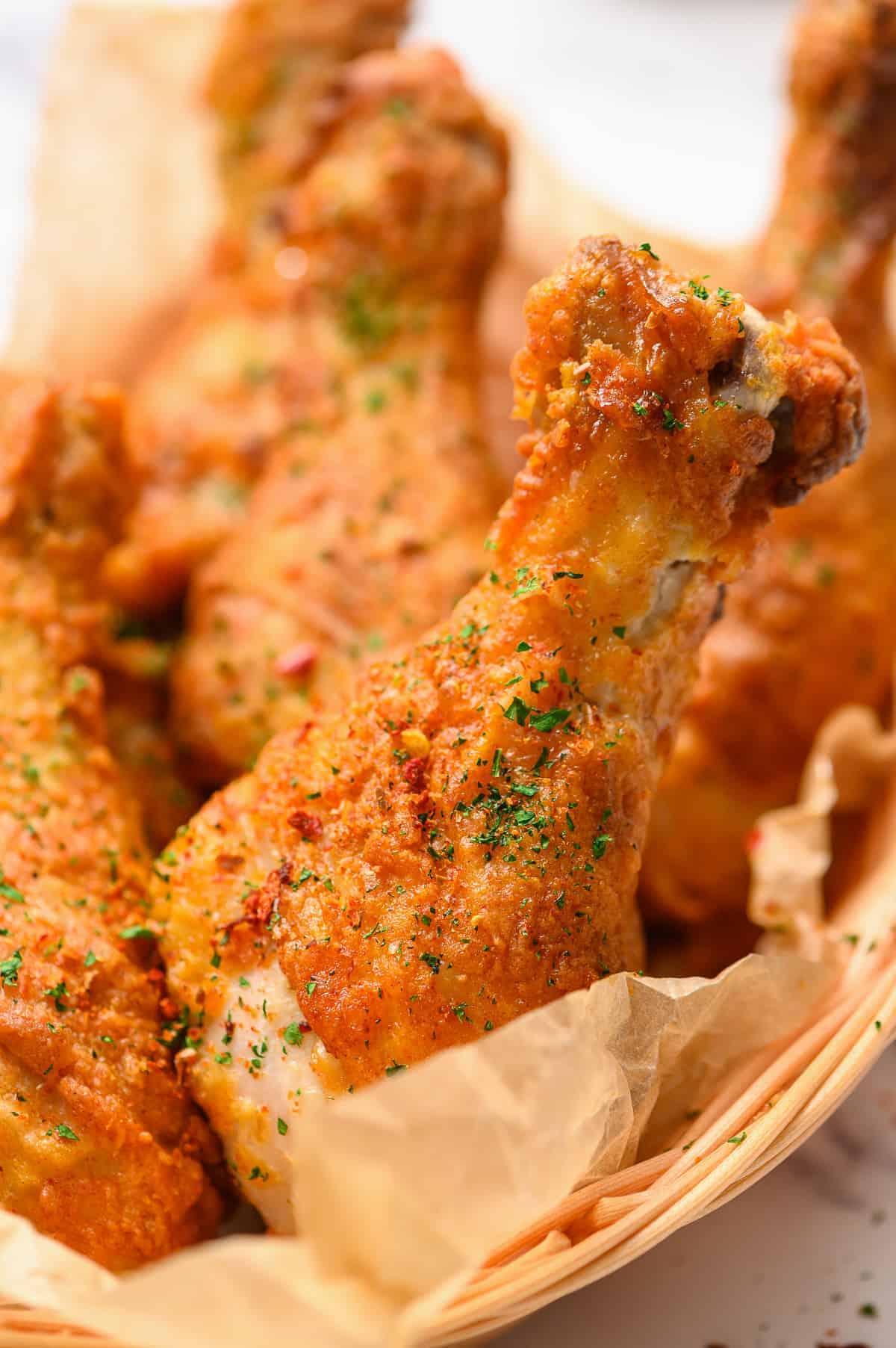 up close picture of baked fried chicken drumsticks