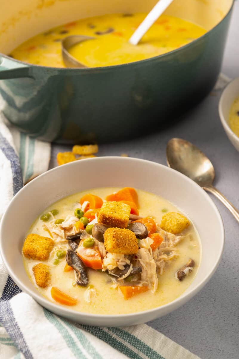 side image of creamy chicken soup topped with croutons