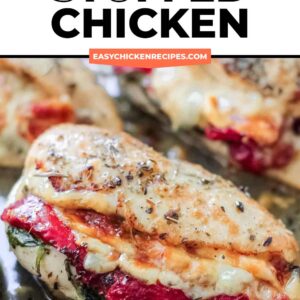 tuscan stuffed baked chicken in a skillet.