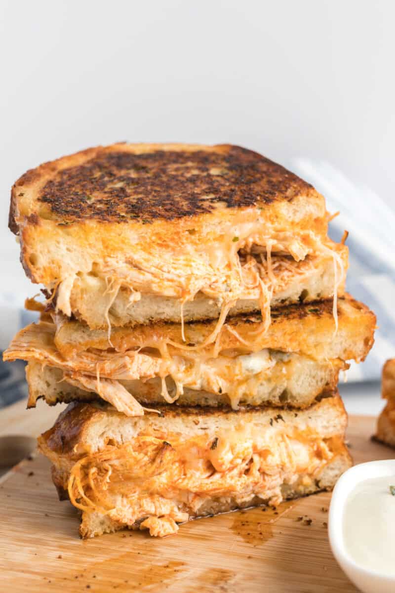 A stach of Buffalo Chicken Grilled Cheese sandwiches