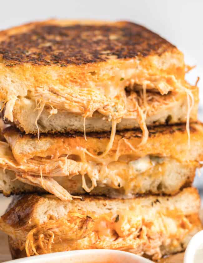up close image of stacked buffalo chicken grilled cheese