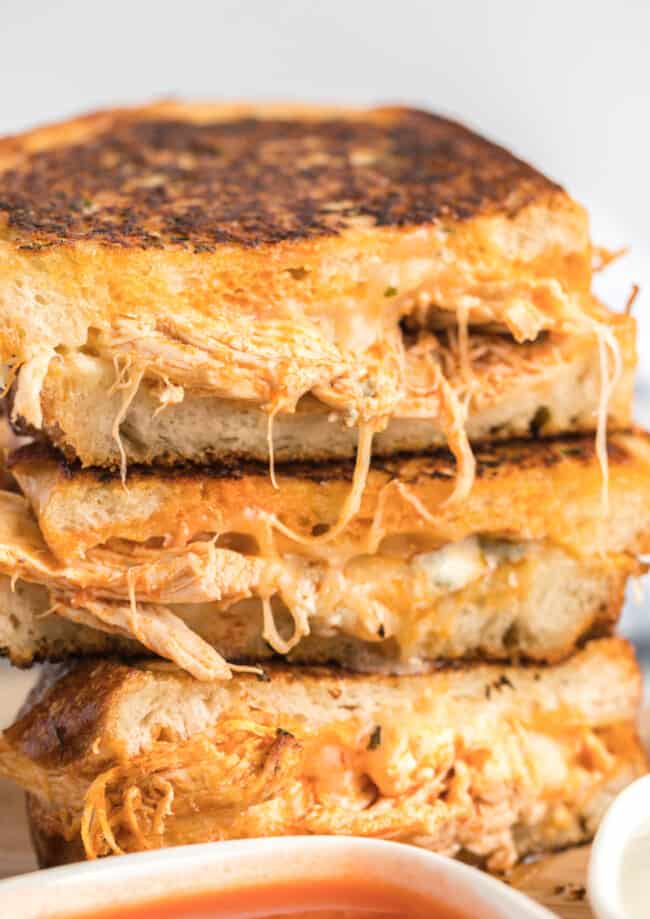up close image of stacked buffalo chicken grilled cheese