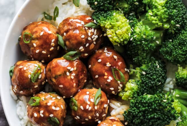 Asian chicken meatballs served with rice and broccoli