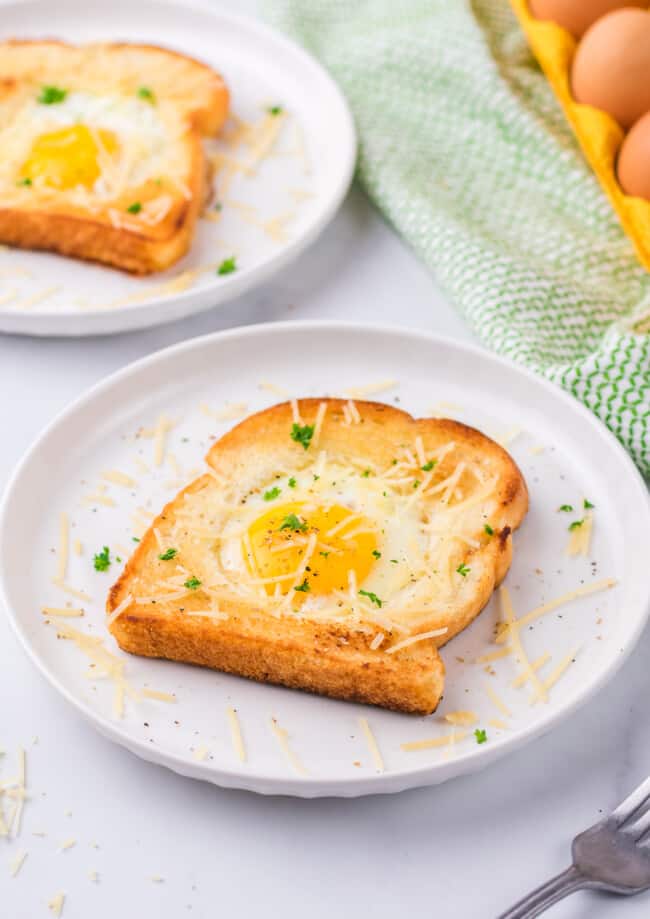 Two slices of toast with an egg on top, also known as Eggs in a Hole.