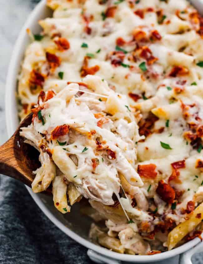 lifting up cheesy chicken bacon ranch pasta