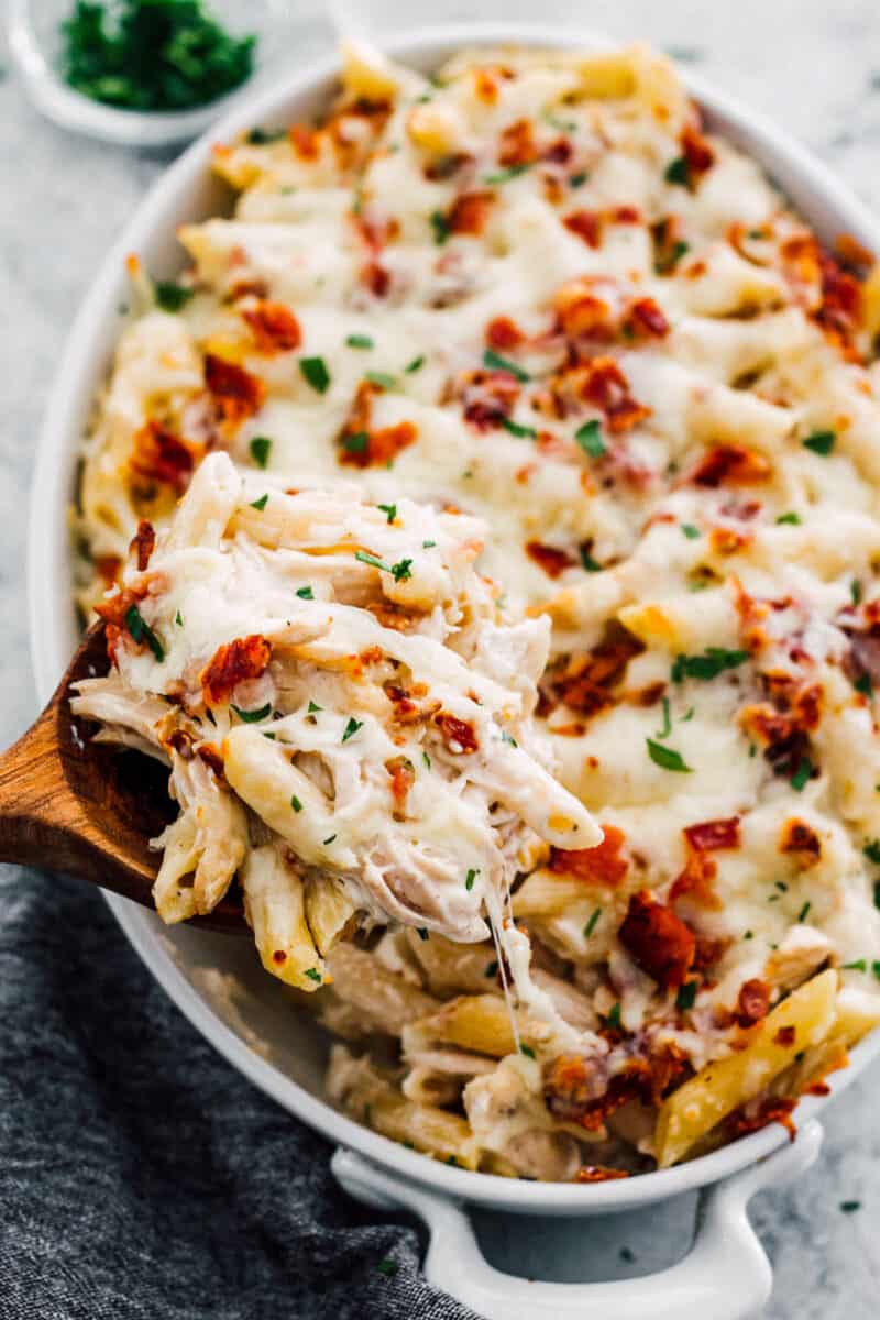 spoon lifting up chicken bacon ranch pasta