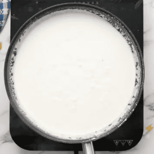 white cream sauce in a pan.