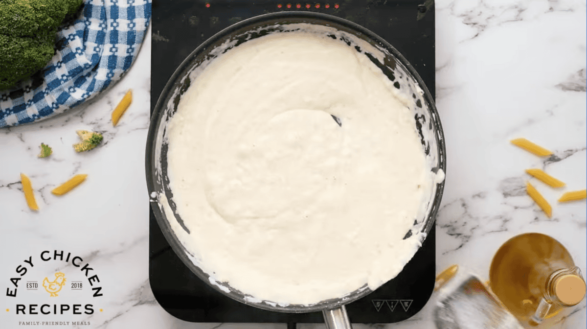 cheesy cream sauce in a pan.
