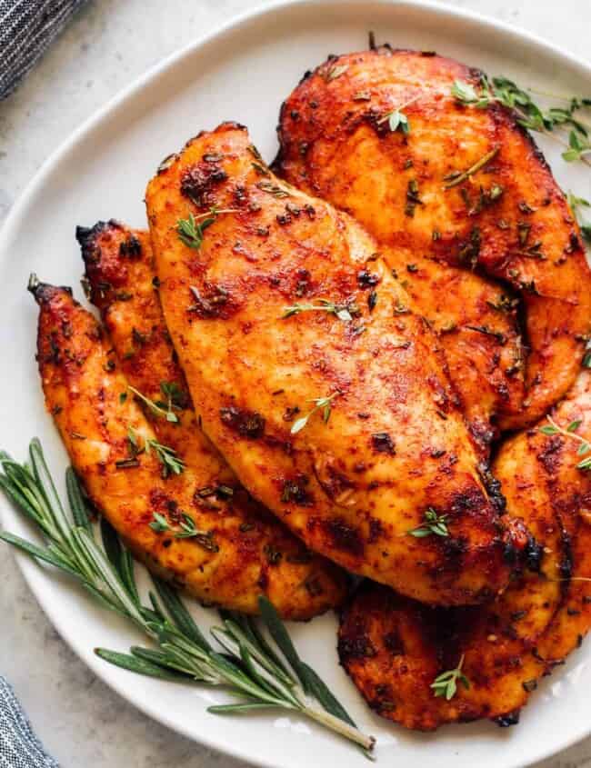 juicy baked chicken breast on plate