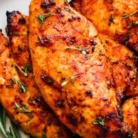 juicy baked chicken breast on plate