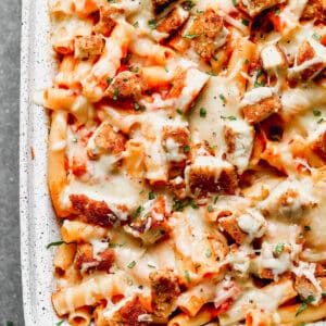 baked chicken parmesan pasta in baking dish