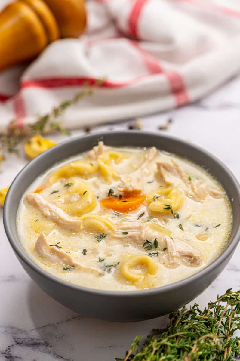 creamy chicken tortellini soup in bowl